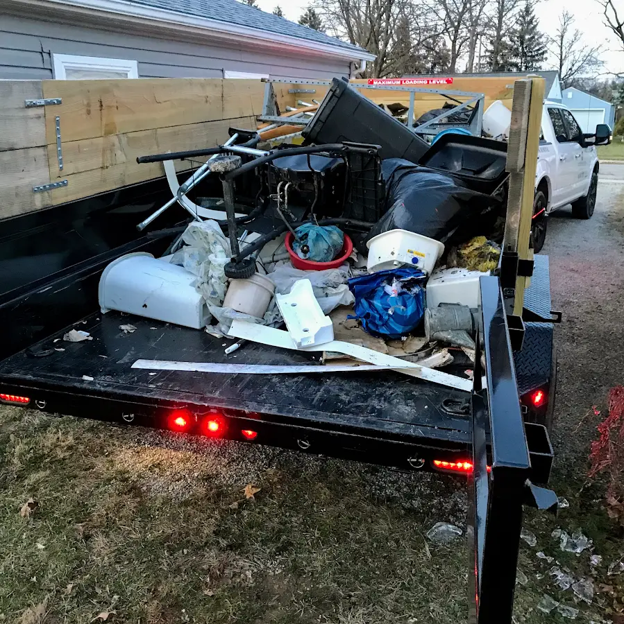 Roll-off dumpster delivered to a residential driveway in Bridge City