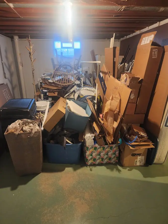 Roll-off dumpster container at job site for Cleanout Dumpster Rental in Bridge City